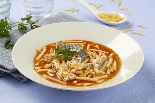 Noodles in tomato broth — Stock Photo
