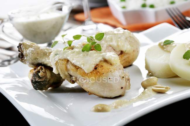Chicken legs with sauce — Stock Photo