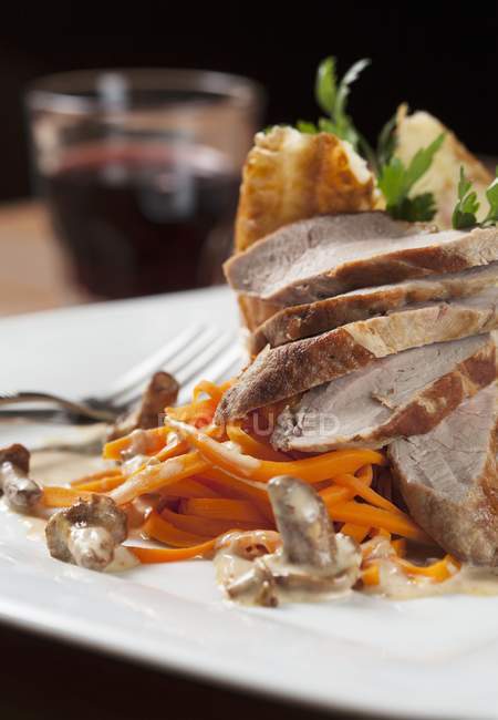 Roast pork with carrots — Stock Photo