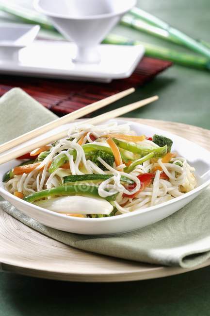 Vegetables and noodles on plate — Stock Photo