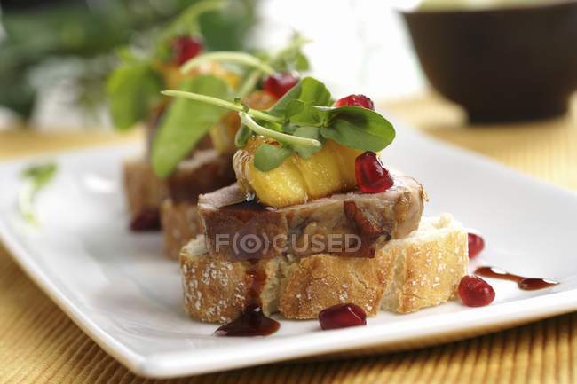 Pork canape with pineapple — Stock Photo