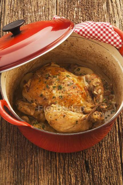 Whole Chicken braised in cider — Stock Photo