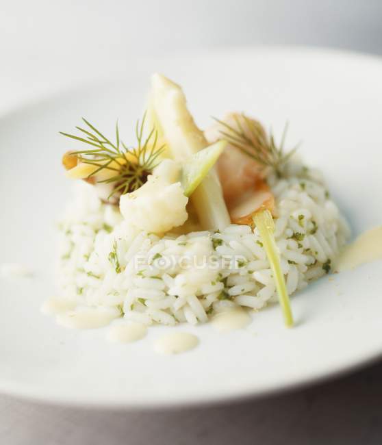 Herb rice with white asparagus — Stock Photo