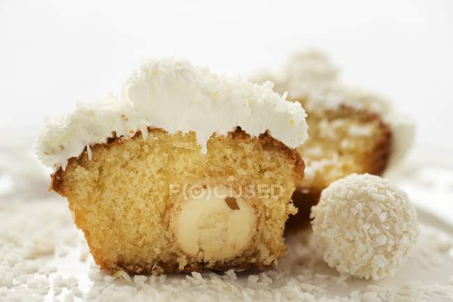 Coconut muffins on plate — Stock Photo