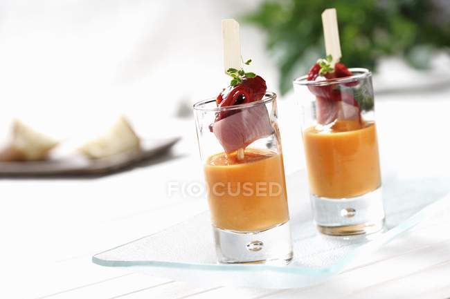Salmorejo - creamy, cold soup with a skewer of fish — Stock Photo