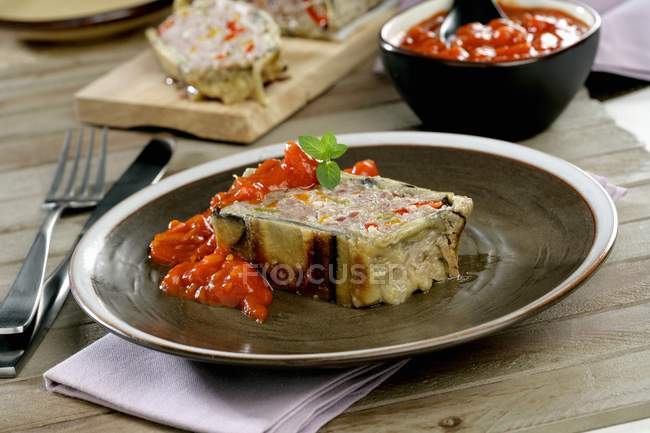 Meatloaf wrapped in aubergine — Stock Photo