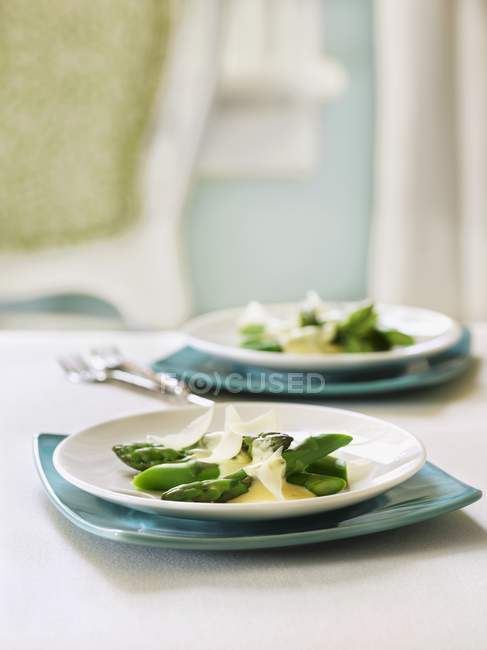 Poached asparagus with parmesan — Stock Photo