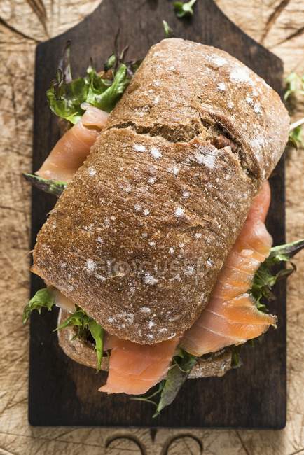 Smoked salmon and sandwich — Stock Photo