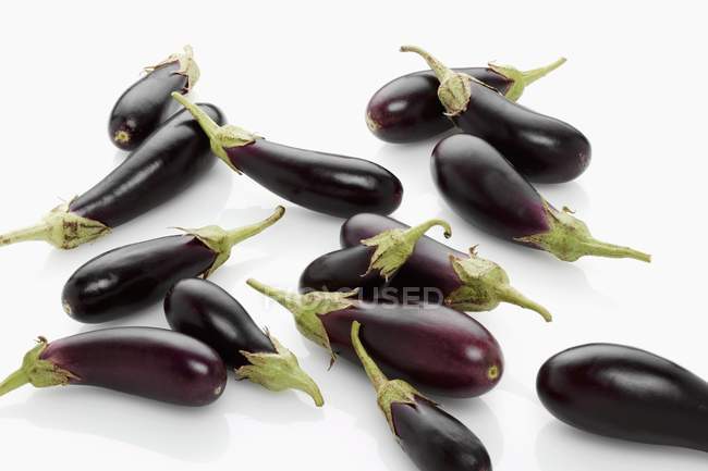 Fresh baby aubergines — Stock Photo