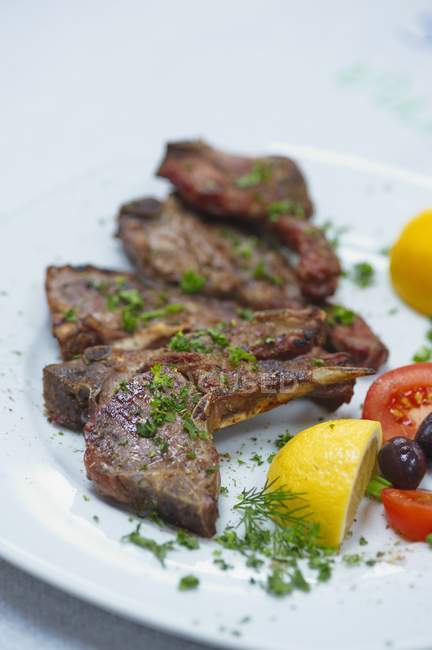 Barbecued chops with herbs — Stock Photo