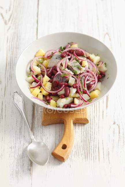 Herring and potato salad with onions — Stock Photo