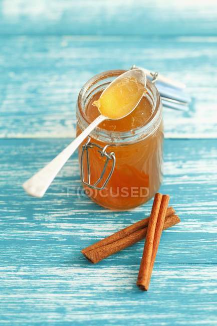 Fruit jam with cinnamon in jar — Stock Photo
