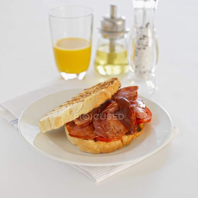 Toasted sandwich with bacon — Stock Photo