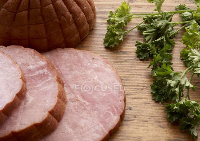 Sliced Ham and Fresh Parsley — Stock Photo
