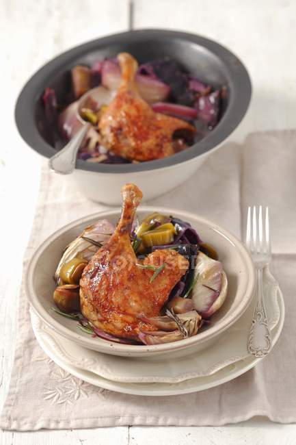 Duck legs with fennel and red cabbage — Stock Photo
