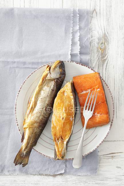Smoked salmon, halibut and trout — Stock Photo