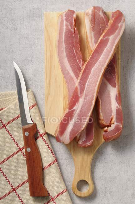 Slices of Speck ham — Stock Photo