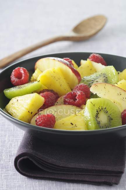 Fruit salad with pineapple — Stock Photo