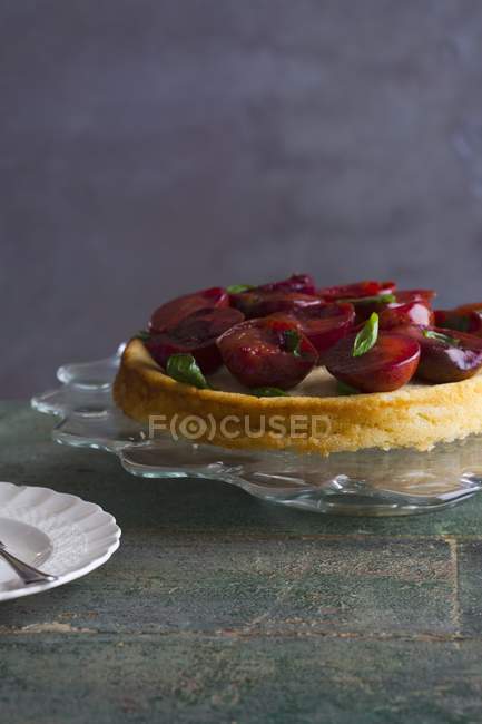 Cake with Plums and Basil — Stock Photo