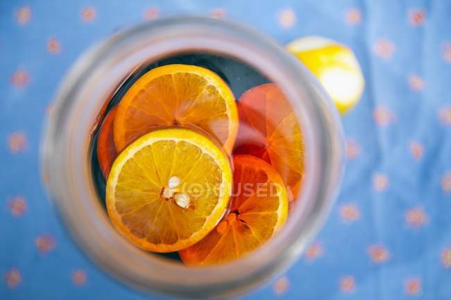 Summer drink with citrus fruits — Stock Photo