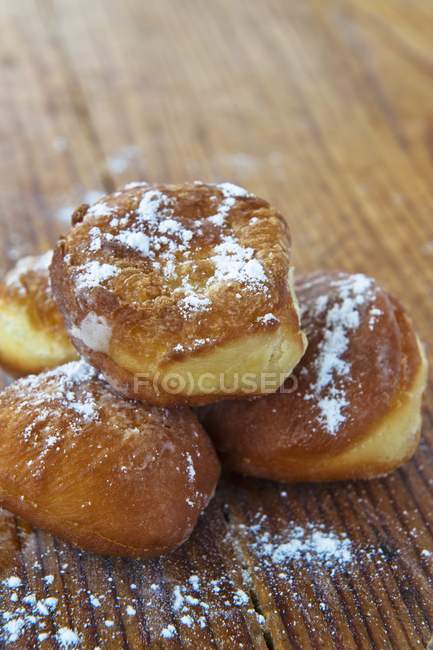 Doughnuts with icing sugar — Stock Photo