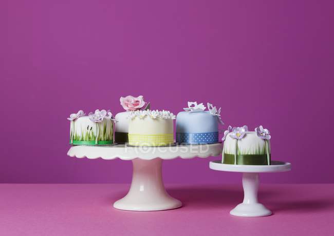 Celebration cakes on cake stands — Stock Photo