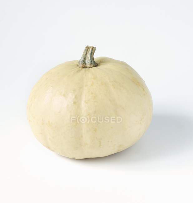 A yellow gourd on white background — Stock Photo