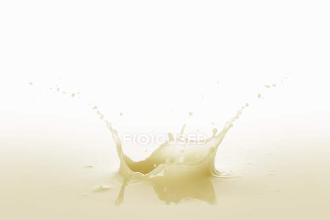 Banana juice with splash — Stock Photo