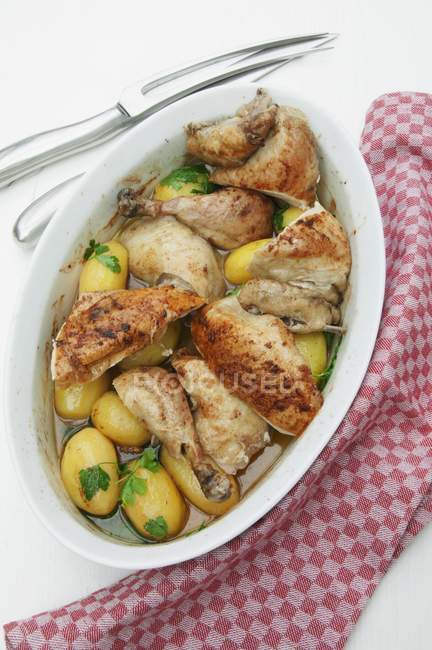 Roasted chicken with boiled potatoes — Stock Photo
