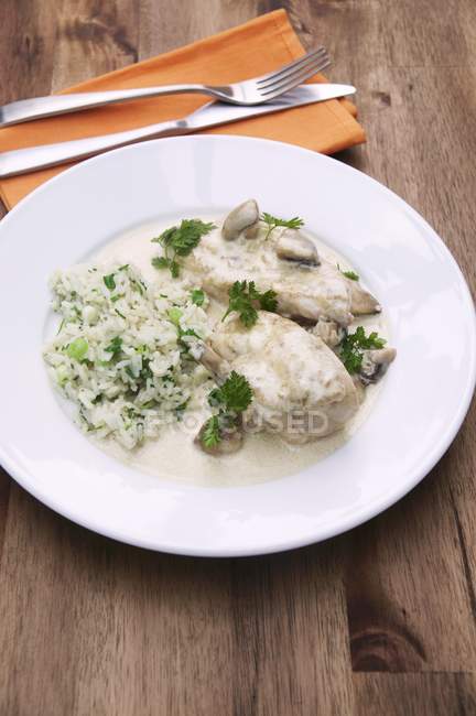 Corn-fed spring chicken breast with rice — Stock Photo