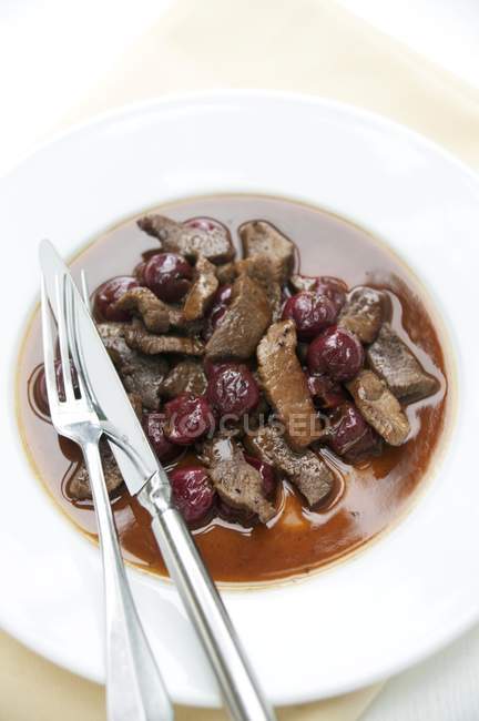 Chopped venison with sauce — Stock Photo