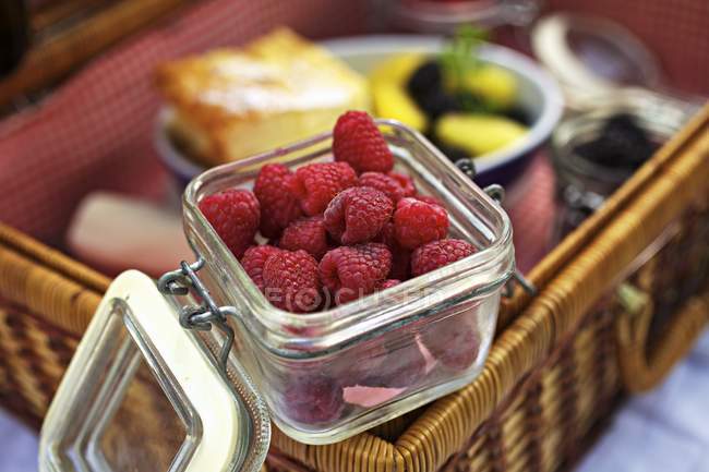 Fresh raspberries in jar — Stock Photo
