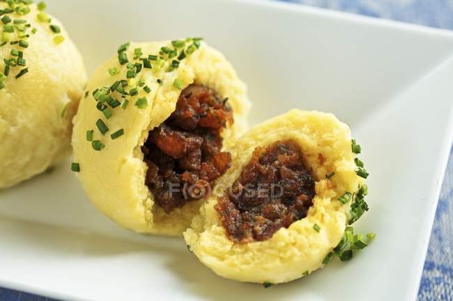 Closeup view of pork Austrian dumplings with herb — Stock Photo