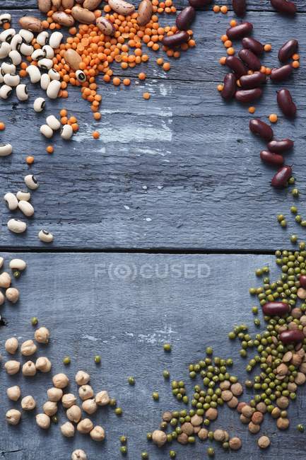 Assorted pulses arranged around the edge of the image — Stock Photo