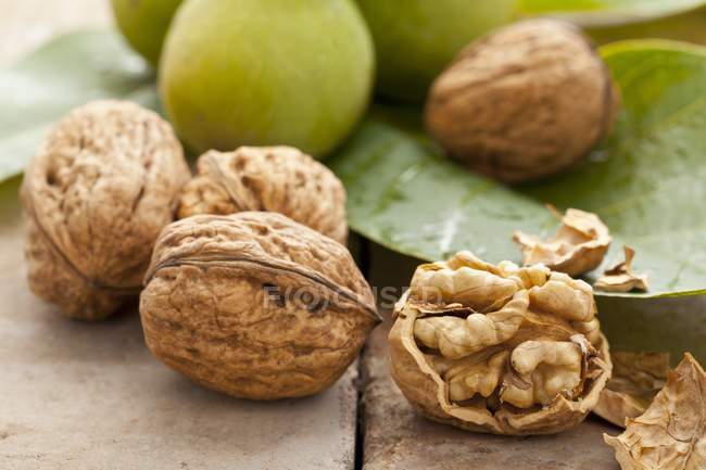 Walnuts on wooden surface — Stock Photo