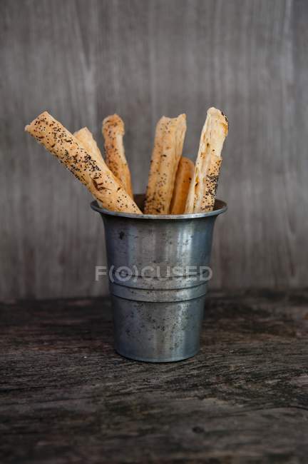 Pastry straws in container — Stock Photo