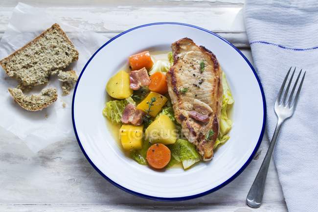Pork chop with vegetable stew — Stock Photo