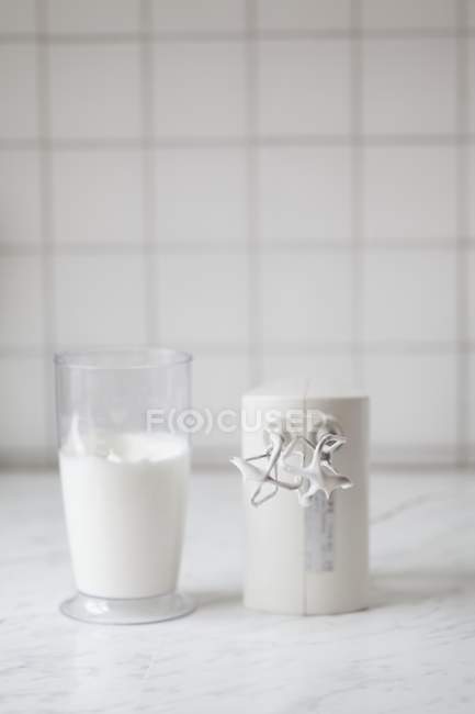 Closeup view of beaten egg whites and white mixer — Stock Photo