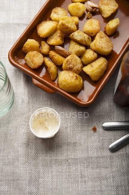 Oven-roasted potatoes with mayonnaise — Stock Photo