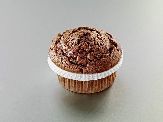 Muffin dans une boîte en papier — Photo de stock