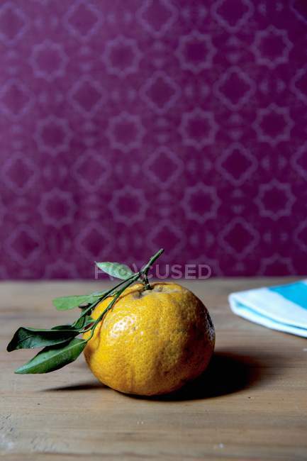 Mandarin on wooden table — Stock Photo