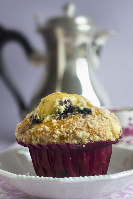 Blueberry muffin in plate — Stock Photo