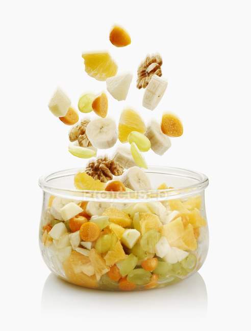 Fruit salad with walnuts — Stock Photo