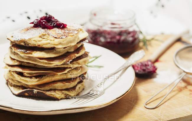 Pancakes with cranberry jam — Stock Photo