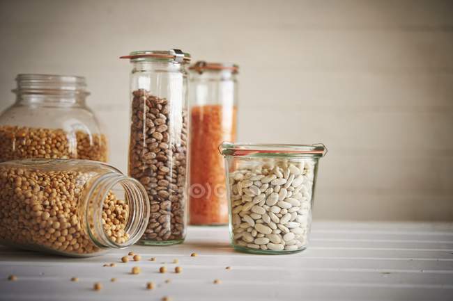 Assorted jars of beans — Stock Photo