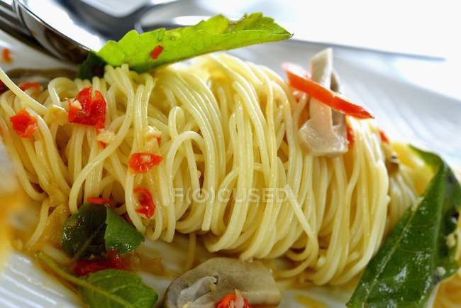 Spaghetti pasta with chillies — Stock Photo