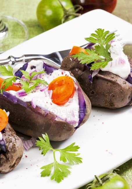 Purple baked potatoes — Stock Photo
