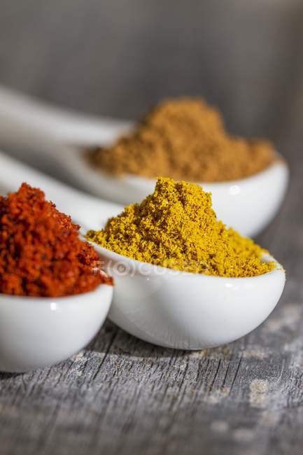 Closeup view of three spoons of different spices — Stock Photo