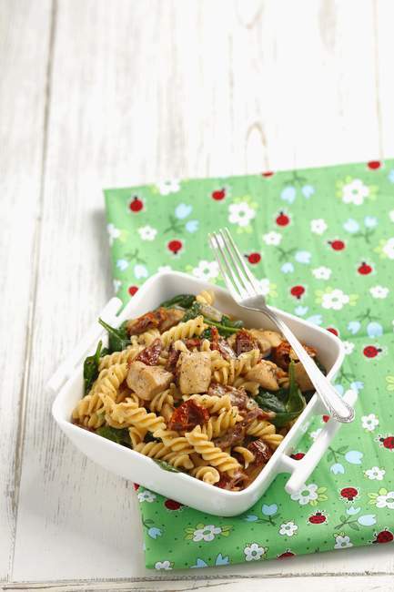 Fusilli pasta with chicken — Stock Photo