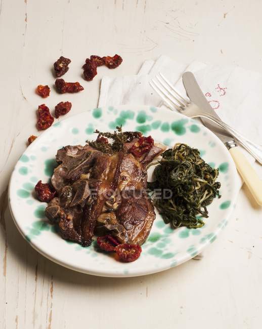 Lamb cooked in casserole with herbs — Stock Photo